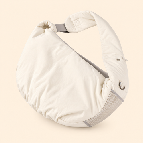 PrismTail Cloud Sling in Cream – lightweight pet carrier sling bag for cats and dogs