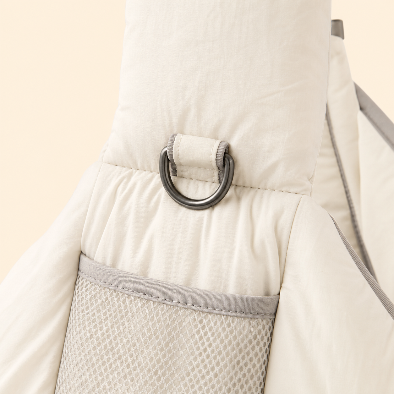 PrismTail Cloud Sling Cream – metal D-ring for attaching accessories