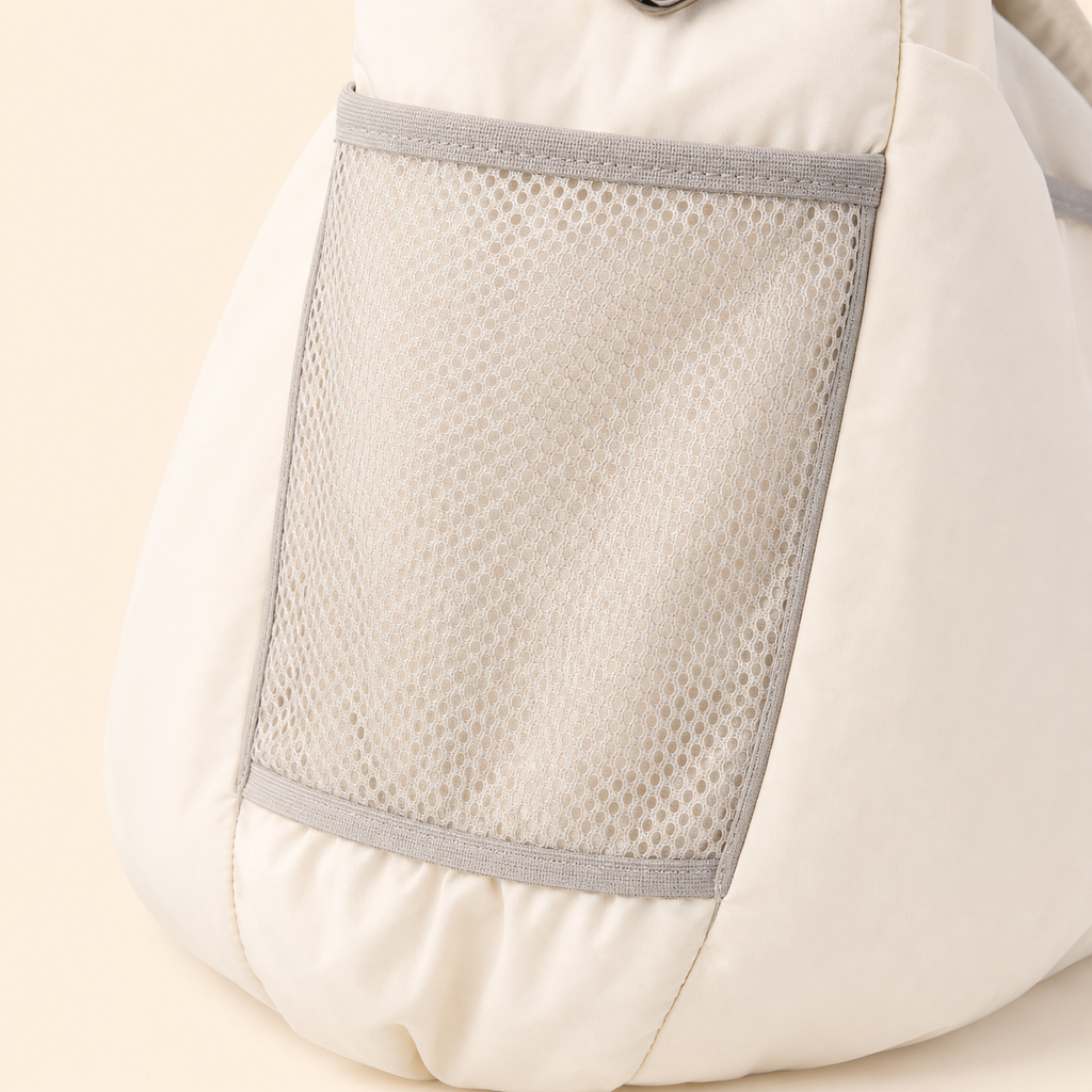 PrismTail Cloud Sling Cream – mesh side pocket for pet treats