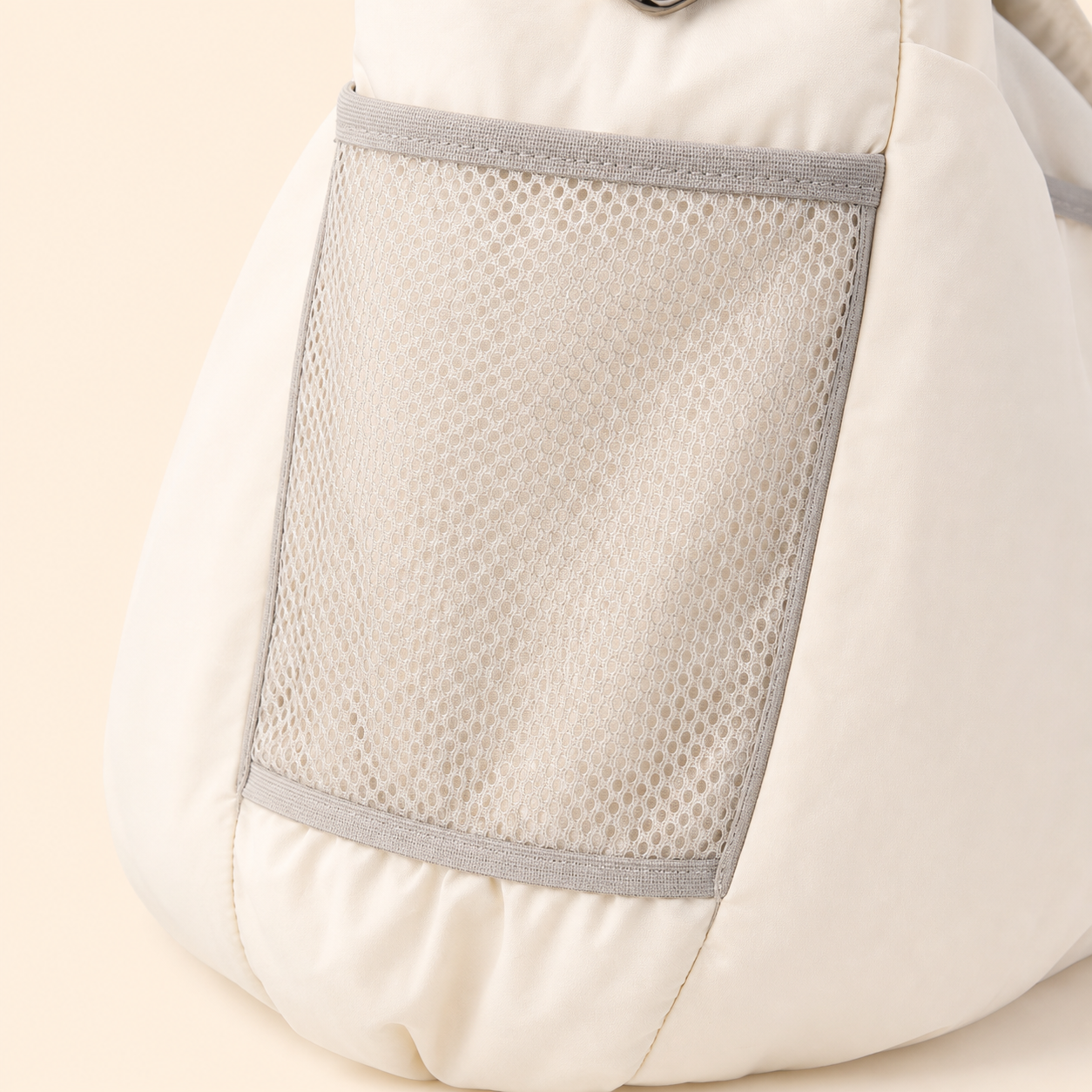PrismTail Cloud Sling Cream – mesh side pocket for pet treats