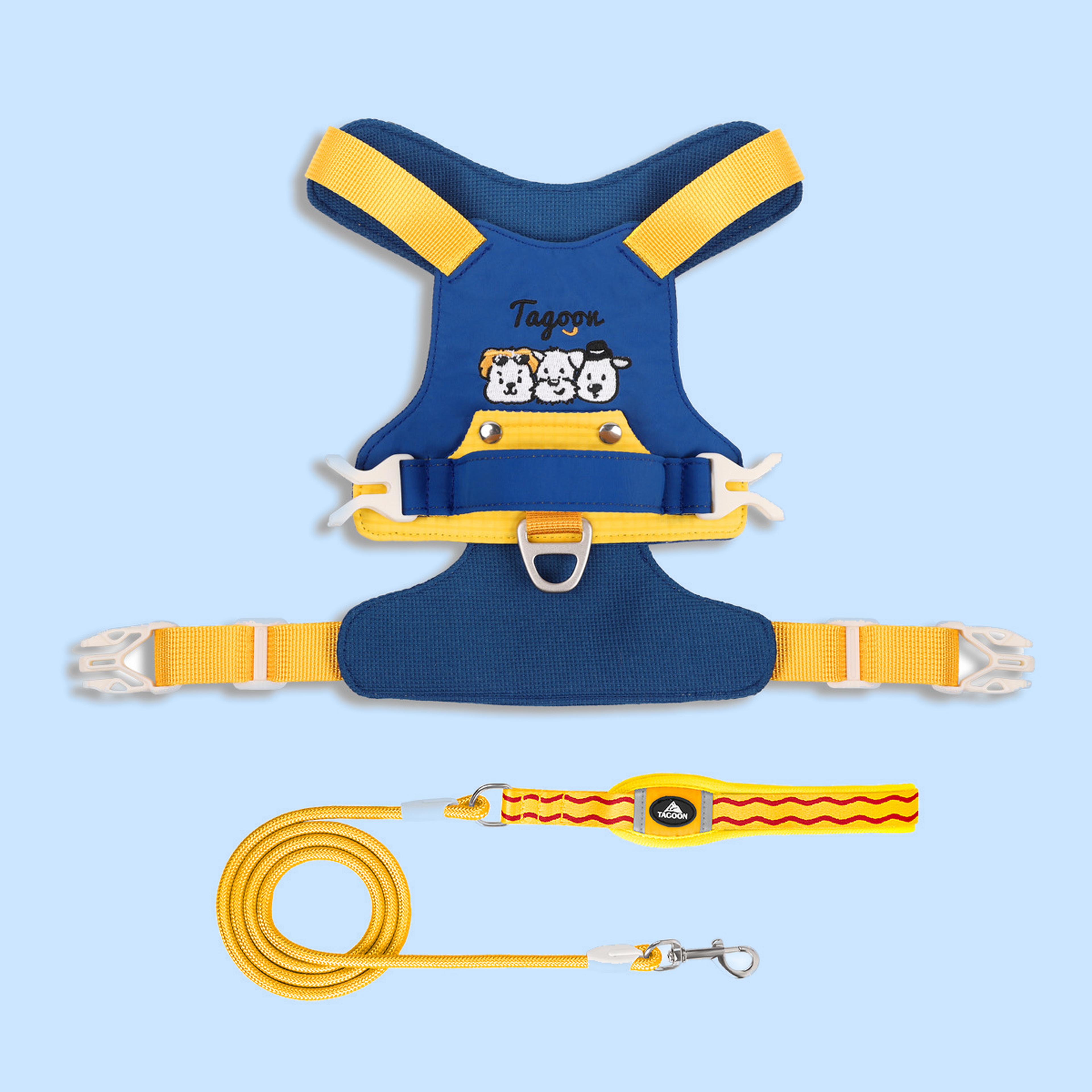 Navy and yellow dog harness and leash set, flat lay