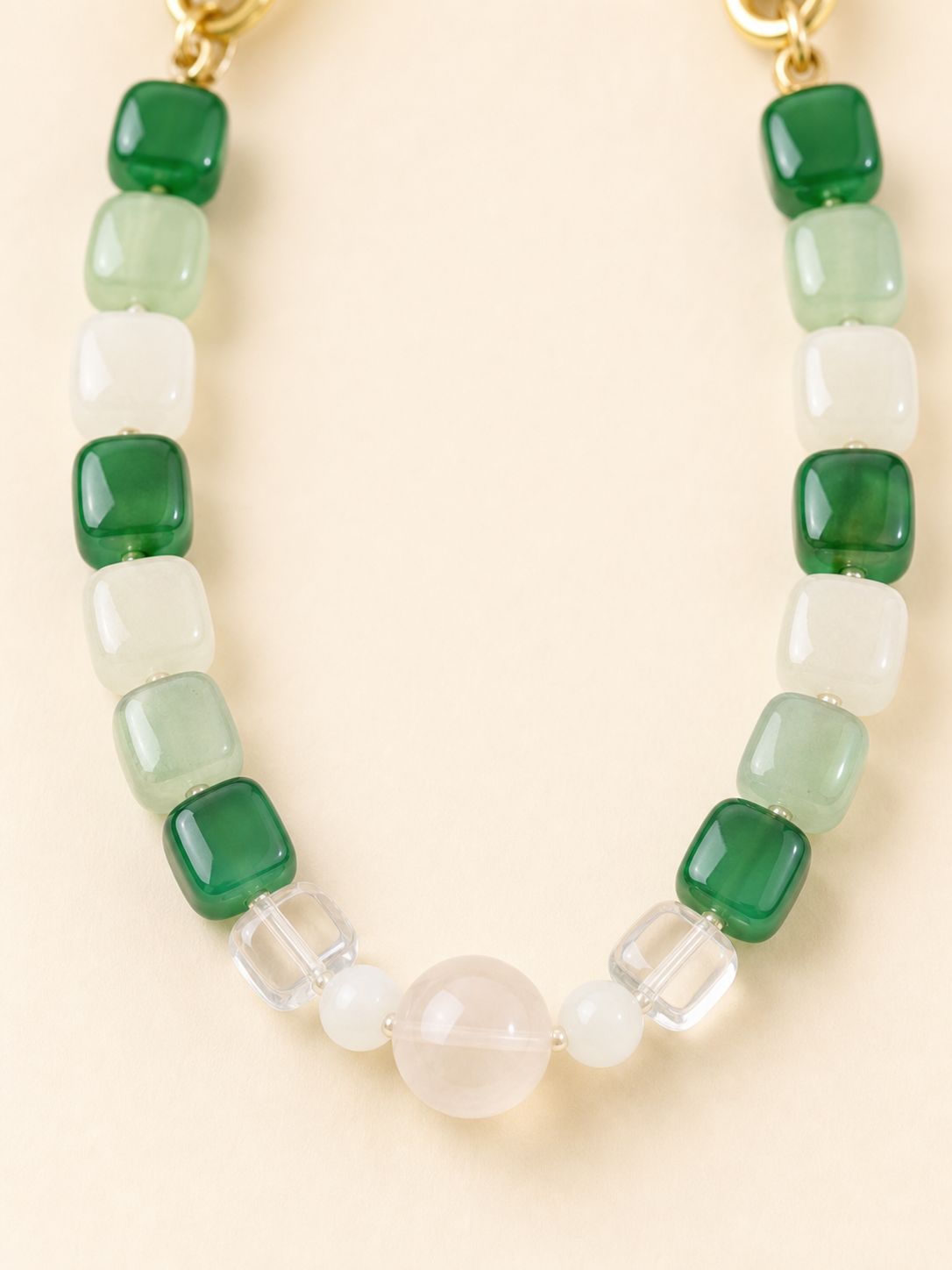 Close-up of green selenite crystal beads on PrismTail natural stone pet collar